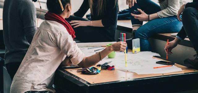 Students studying around a table.